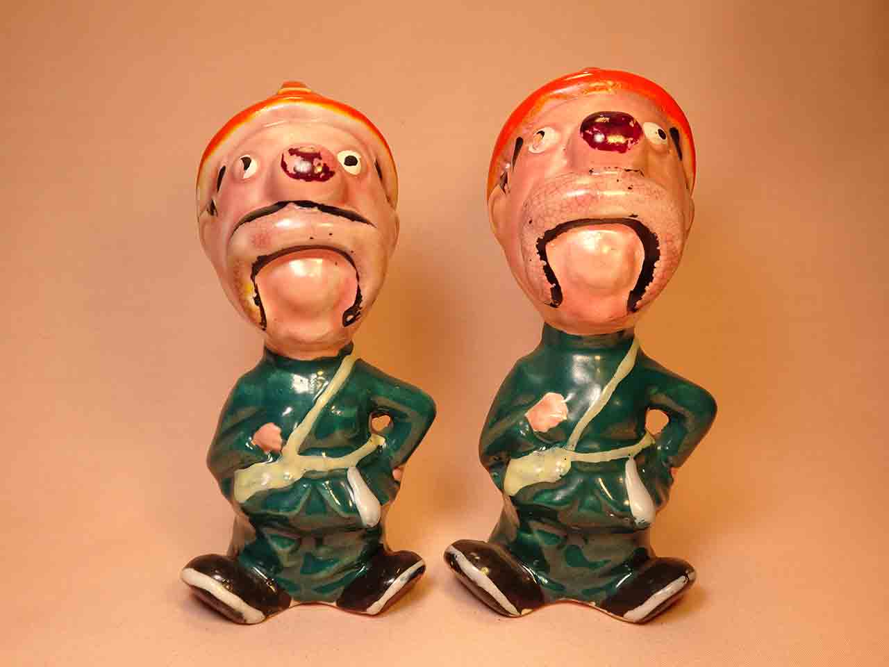 43616 Clown-like strange fellows salt and pepper shakers - firemen